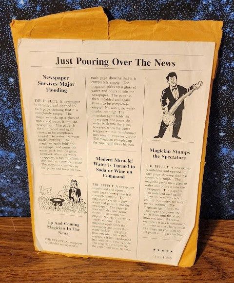 Just Pouring Over The News by Old Town Magic Shop